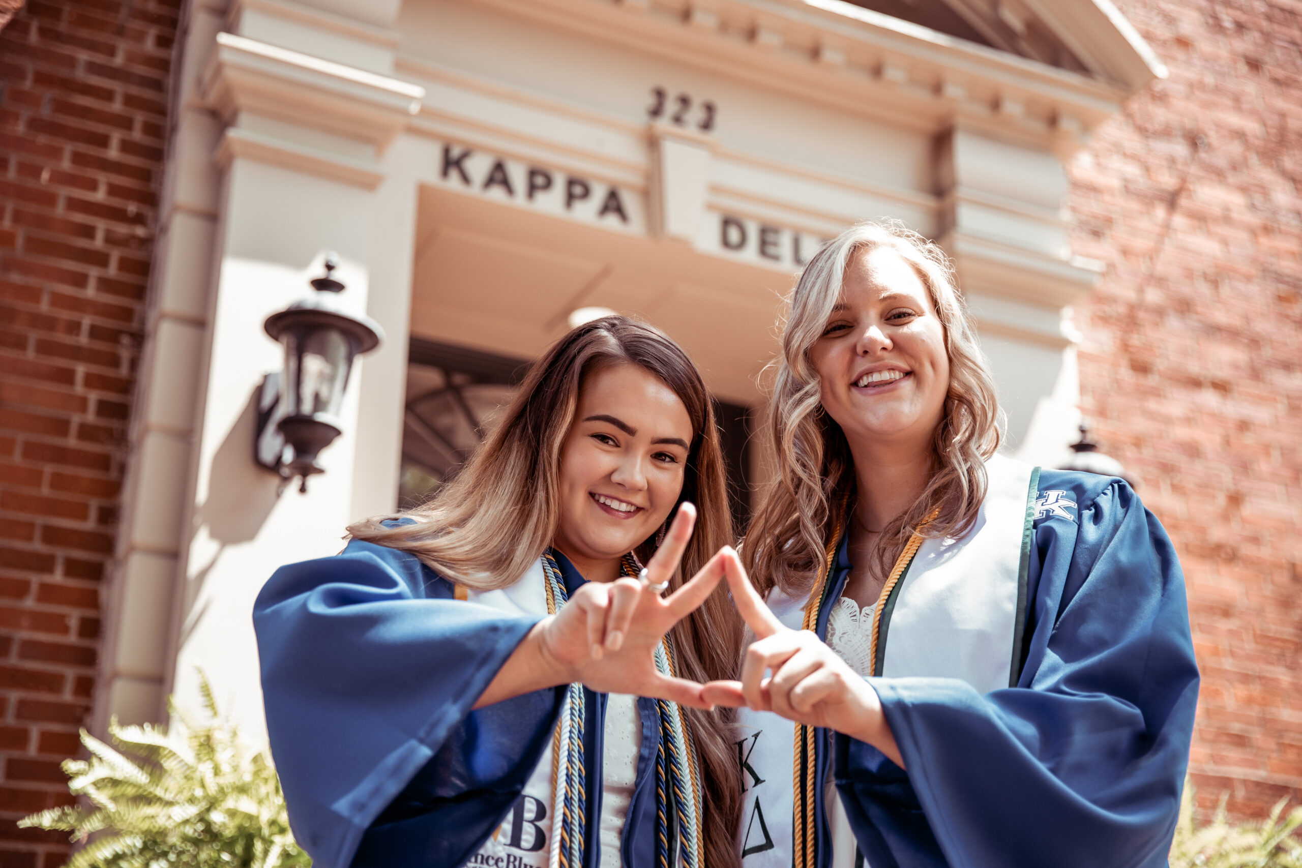 two collegians ready for graduation