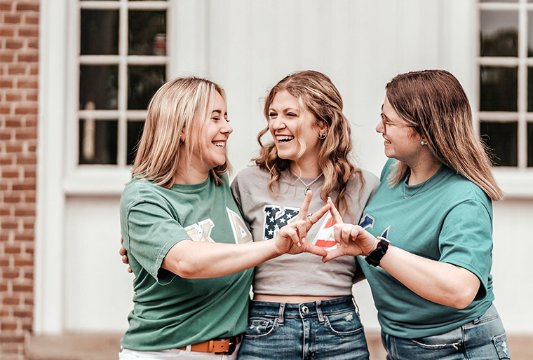 Three kappa delta collegians laughing