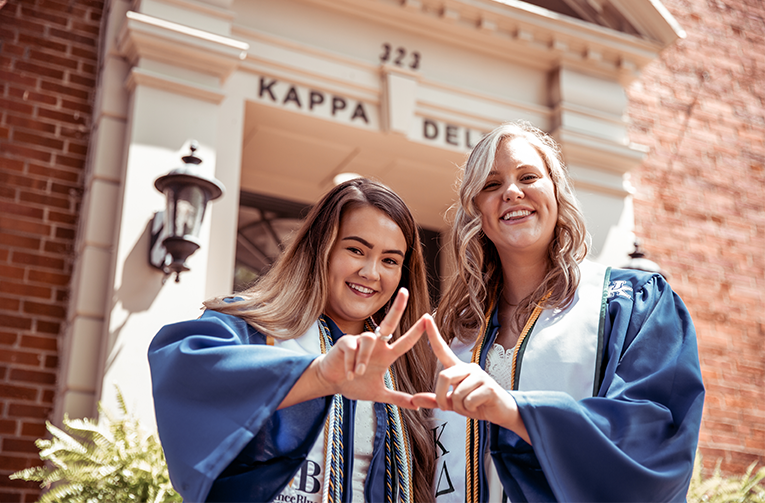 two collegians ready for graduation